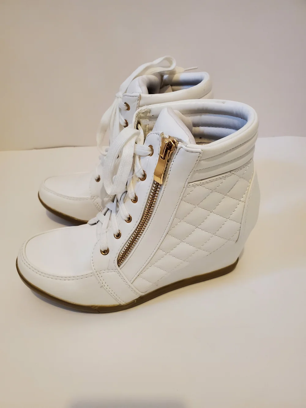 White Quilted Wedge Sneaker with Gold Zipper